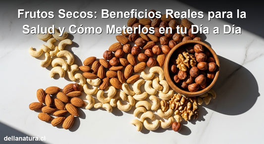 Frutos secos beneficios salud: almendras, cajú y avellanas naturales en superficie de mármol